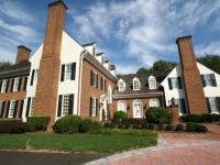 Stately brick entrance to project from Frank M Bell and Ballard + Mensua