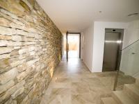 downstairs elevator nook and hallway - Costa Brava Overlook - Ballard & Mensua Architecture