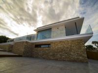 side view of second floor glass - Costa Brava Overlook - Ballard & Mensua Architecture