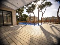 beautiful dark finished deck with backyard pool - Ballard & Mensua