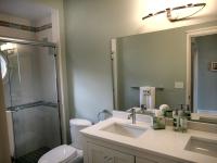 Carr project - nautical New England waterfront home - hall bathroom after