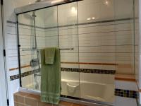 Carr project - nautical New England waterfront home - shower and tub detail