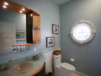 Carr project - nautical New England waterfront home - window and vanity detail