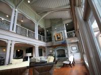 Carr project - nautical New England waterfront home - two-level living room views