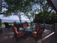 Carr project - nautical New England waterfront home - terrace at sunset