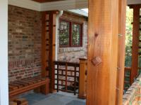 Cedar posts from the front porch of the Ballard's newly renovated home