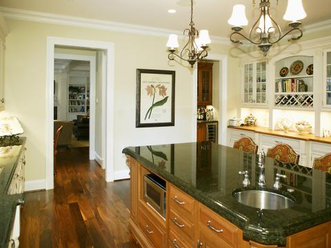 Green and creme kitchen renovation from Ballard & Mensua's project on Selkirk Dr