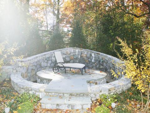 The finalized reflecting pond complete with chaise for outdoor entertaining