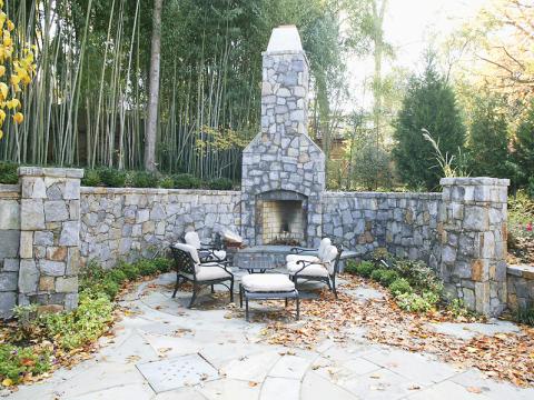 An outdoor stone fireplace for Frank Bell's project on Selkirk Dr.