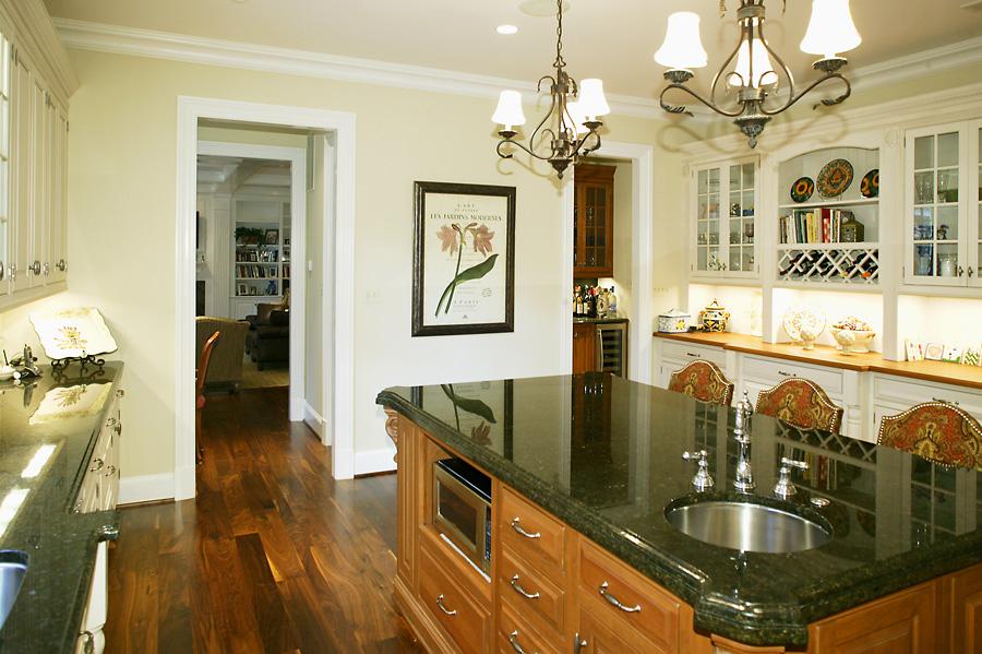 Green and creme kitchen renovation from Ballard & Mensua's project on Selkirk Dr