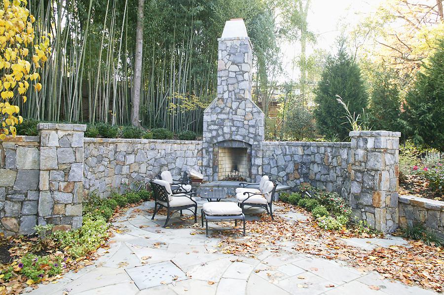 An outdoor stone fireplace for Frank Bell's project on Selkirk Dr.
