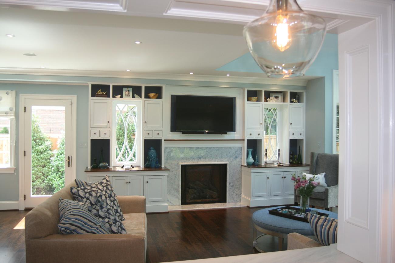 family room with fireplace and tv niche - McLean waterfront - Graham project