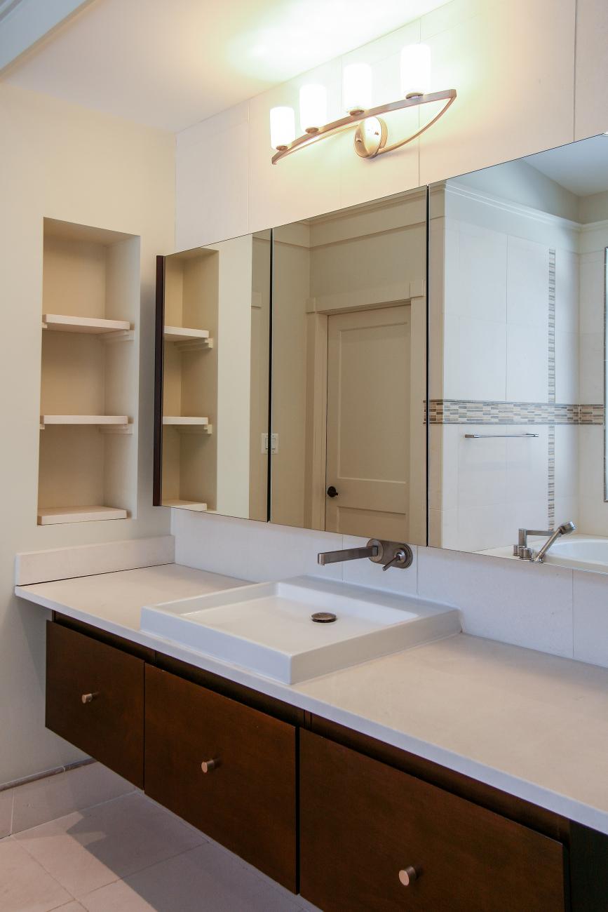 vertical scone in master bath - Modern home makeover - Carr Baron project