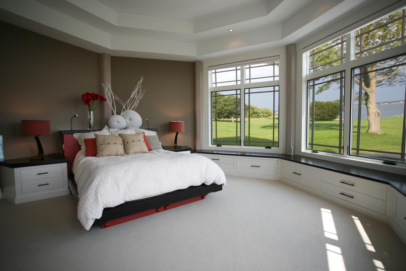 Carr project - nautical New England waterfront home - guest bedroom with picture windows