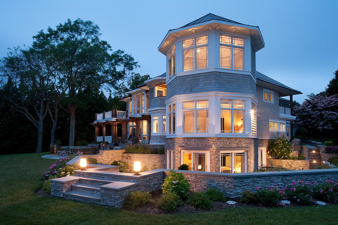 Carr project - nautical New England waterfront home - Octagon lit up at sunset