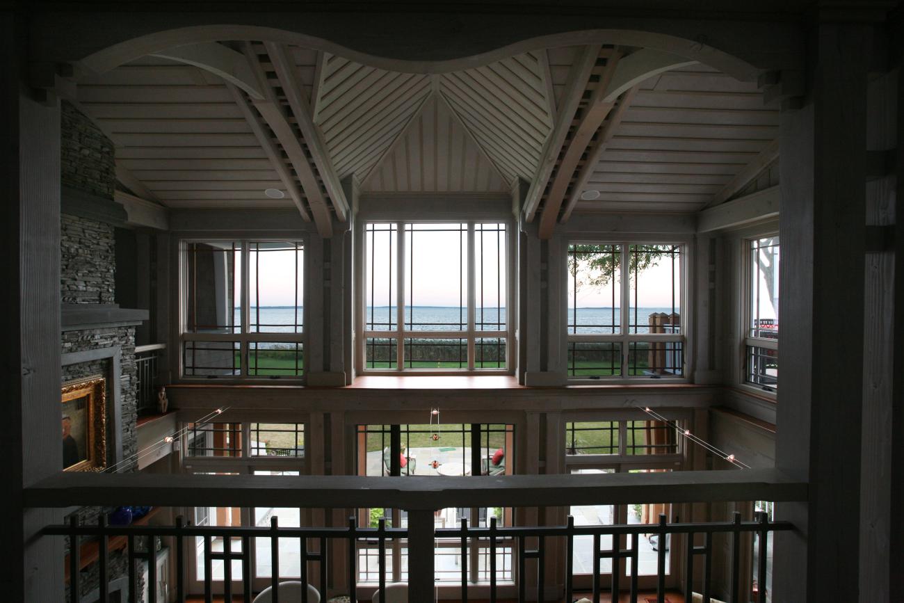 Carr project - nautical New England waterfront home - living bayview windows from second floor