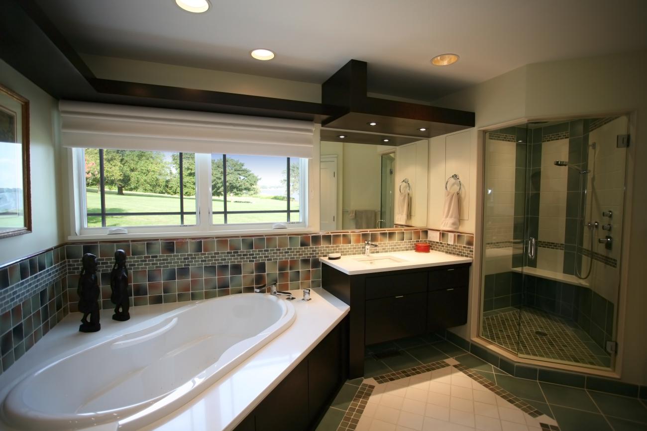 Carr project - nautical New England waterfront home - master bathroom with tub and water views