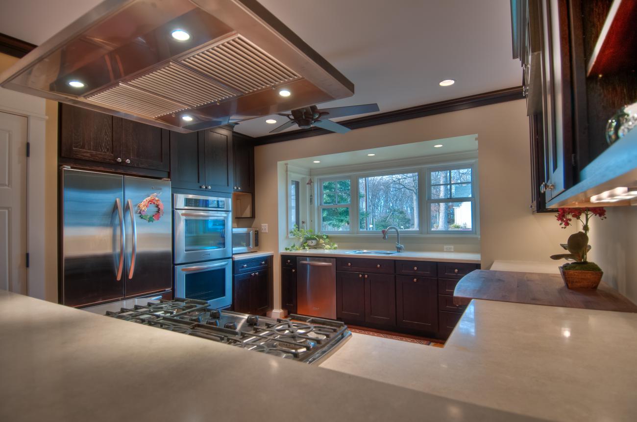 Henry project's kitchen after remodeling with fridge and range