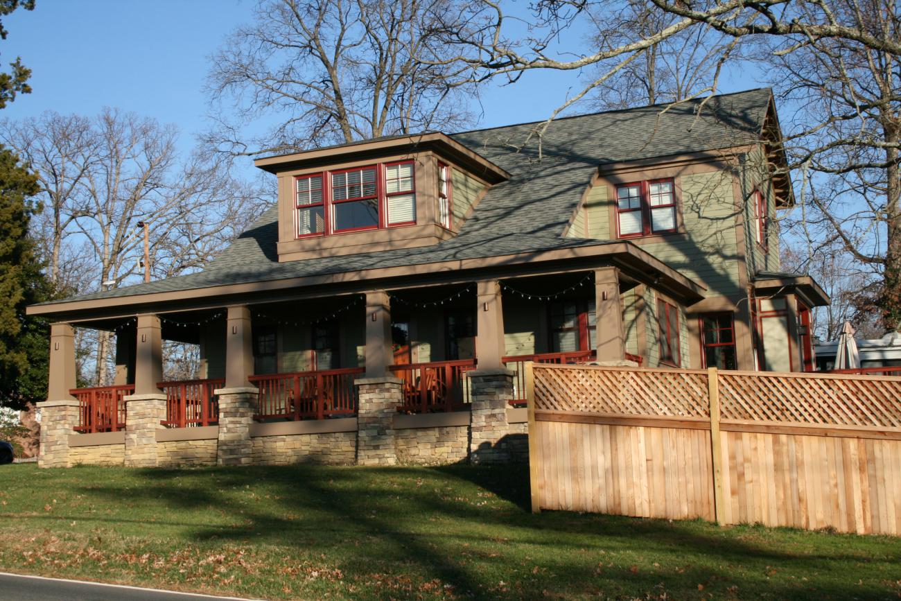 The exterior and right side of the Henry project's house